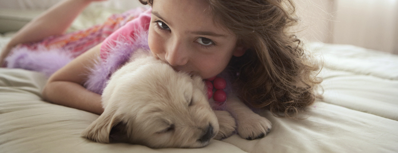 girl and puppy