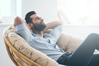 Man enjoys his home after installing zone specific controls.