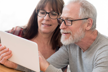 middle-aged couple shopping for a new furnace